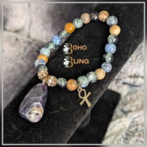 Gold and Blue Beaded Bracelet with Teardrop Pendant
